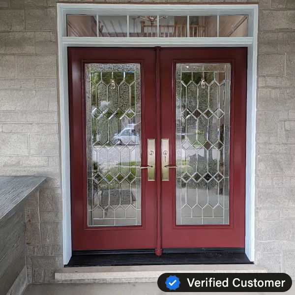 A double front door with red frames and decorative glass panels featuring a geometric pattern graces the brick wall, complemented by a rectangular transom window. A Verified Customer badge at the bottom right corner attests to top-notch service, perfect for anyone considering door repair in Scarborough.