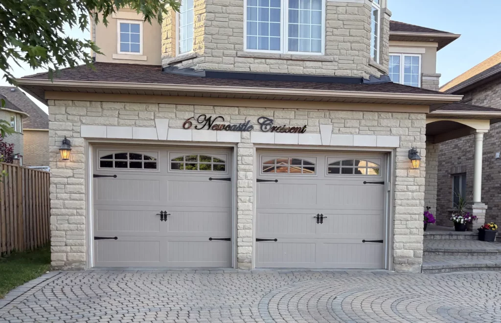 New garage door installation in Mississauga, Grey modern garage door.