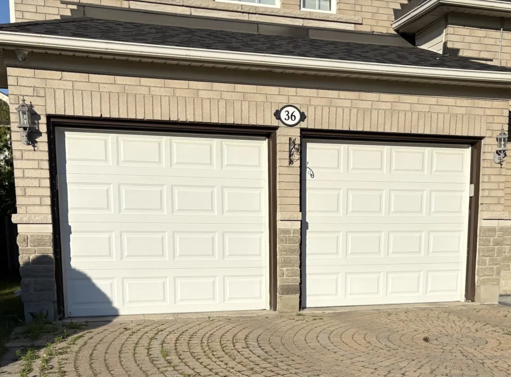 white double garage door opener repair in Mississauga